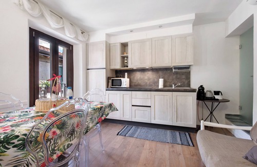 Mandello del Lario Apartment | Holiday Apartment "Lario Le Coccinelle Home" with a View of Lake Como, Balcony & Wi-Fi