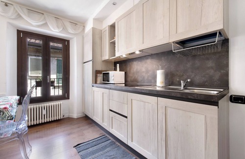 Mandello del Lario Apartment | Holiday Apartment "Lario Le Coccinelle Home" with a View of Lake Como, Balcony & Wi-Fi