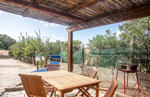 Paduledda Apartment | Holiday Apartment with Fireplace, Garden & Terrace; Parking Available