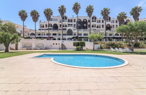 Santa Eulalia Apartment | Holiday Apartment Apartamentos Ninho das Gaivotas 510 with Wi-Fi, A/C, Pool, Garden & Balcony; Parking Available