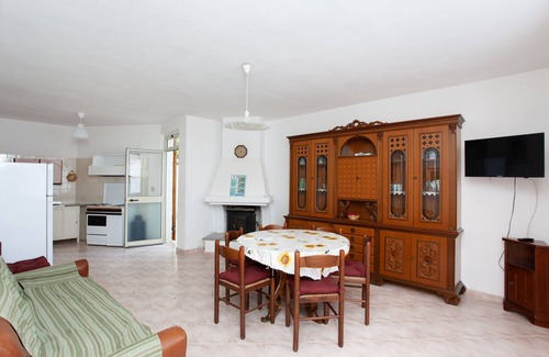 Monte Longu Apartment | Holiday Apartment "Casa Con Giardino" with Mountain View & Shared Terrace