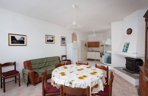 Monte Longu Apartment | Holiday Apartment "Casa Con Giardino" with Mountain View & Shared Terrace