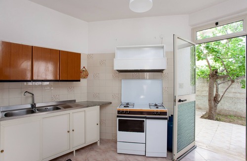 Monte Longu Apartment | Holiday Apartment "Casa Con Giardino" with Mountain View & Shared Terrace