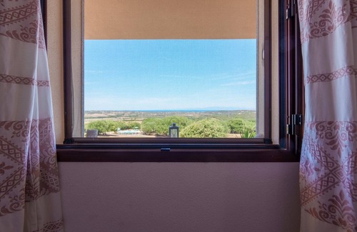 Aglientu Apartment | Holiday Apartment "Casa Ginepro Piscina E Vista Mare" with Sea View, Shared Pool & Wi-Fi