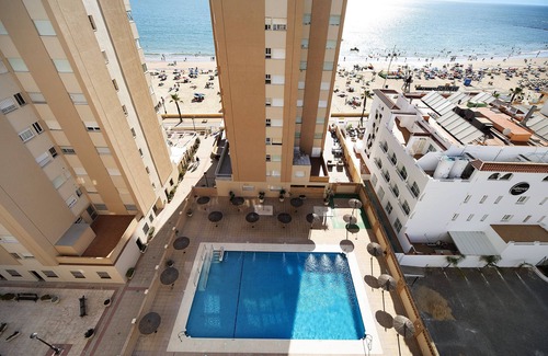 Chipiona Apartment | Holiday Apartment "Doña Amparo Chipiona Playa De Regla" with Sea View & Shared Pool