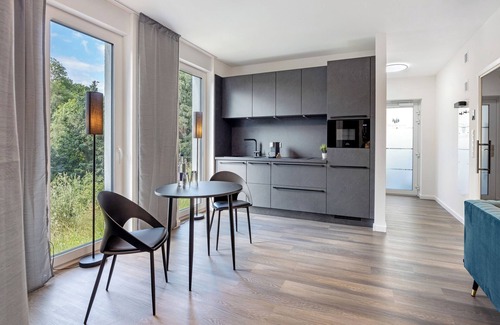 Altenbeken Apartment | Holiday Apartment "Egge Resort 7a" with Balcony, Whirlpool and Sauna