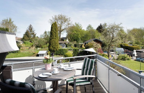 Eckernfoerde Apartment | Holiday Apartment "Hüsing" with Private Garden, Balcony & Wi-Fi