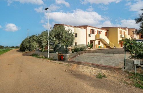 Masainas Apartment | Holiday Apartment "Is Lais 1" with Sea View, Shared Garden & Wi-Fi