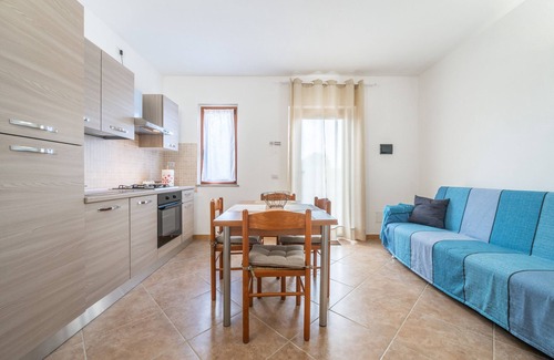 Masainas Apartment | Holiday Apartment "Is Lais 3" with Sea View, Shared Garden & Wi-Fi