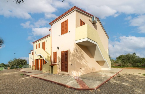 Masainas Apartment | Holiday Apartment "Is Lais 3" with Sea View, Shared Garden & Wi-Fi