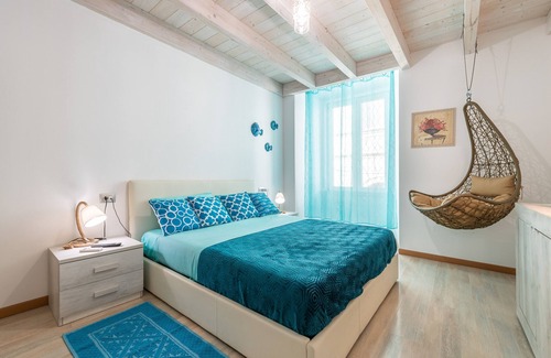 Carloforte Apartment | Holiday Apartment "La Perla con Balcone" with Private Balcony, A/C & Wi-Fi
