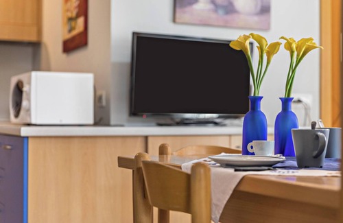 Livigno Apartment | Holiday Apartment Omega - Casa Azzurra Piano Terra with Mountain View, Wi-Fi & Garden