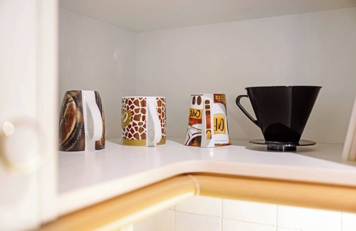 Nordstrand Apartment | Holiday Apartment 'Op'nböhn' with Shared Garden and Private Beach Chair