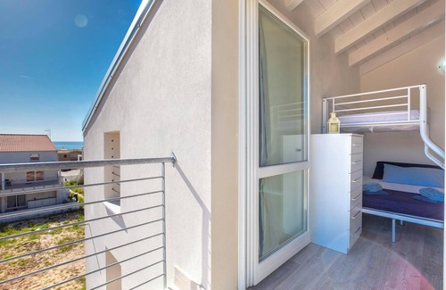 Trinita d'Agultu e Vignola Apartment | Holiday Apartment “Sa Domo Mea Isola Rossa” with Sea View and Air Conditioning