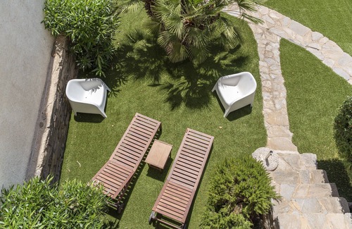 Stintino Apartment | Holiday Apartment "Stintino Sea Front Apartments A" with Sea View and Shared Garden