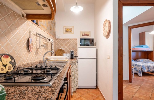 Santa Maria Navarrese House | Holiday Home 'Sa Domu De Ettore' with Private Terrace, Wi-Fi and Air Conditioning