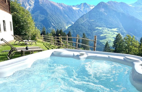 San Martino in Passiria Ski Chalet | Holiday Home “ Bergsuite” with Mountain View, Balcony, Garden & Wi-Fi
