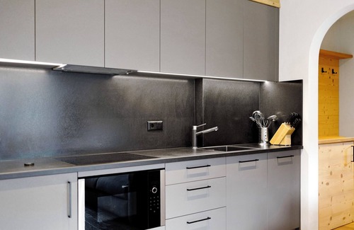 San Martino in Badia Apartment | Holiday Home “Ciasa Funtanies Pütia” with Mountain View, Balconies & Wi-Fi