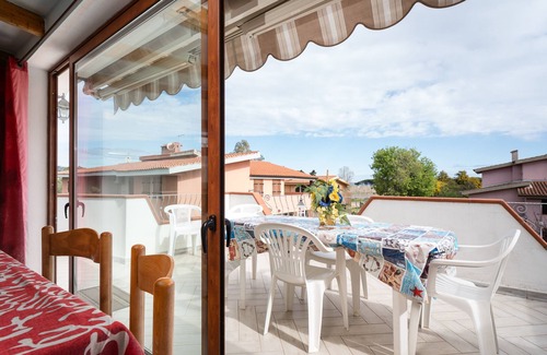 Budoni House | Holiday Home 'Al Mare Da Mémé' with Sea View, Private Terrace and Air Conditioning