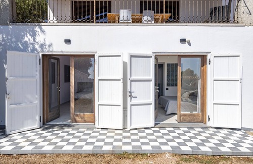 Arzana House | Holiday Home 'Ami' with Sea View, Private Terrace and Shared Garden