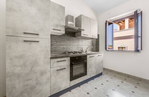 Arbus House | Holiday Home 'Arbus Aventino Centrale' with Private Terrace and Air Conditioning