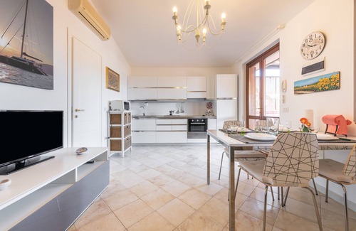 Villasimius House | Holiday Home 'Attico Il Mandorleto' with Mountain View and Air Conditioning
