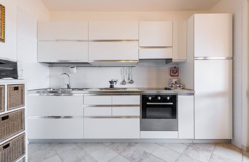 Villasimius House | Holiday Home 'Attico Il Mandorleto' with Mountain View and Air Conditioning
