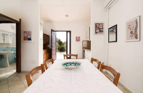 Orosei House | Holiday Home "Casa in Campagna Totale Relax" with Sea View, Private Garden & Wi-Fi