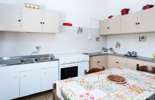 Iscra e Voes House | Holiday Home 'Casa Sa Petra Ruja' with Sea View, Private Terrace and Private Garden