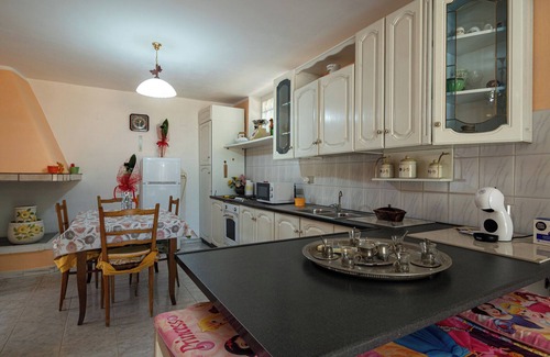 Iglesias Historic Centre House | Holiday Home 'Casa Teresa' with Mountain View, Private Terrace & A/C