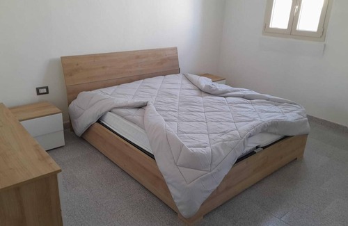 Portoscuso House | Holiday Home 'Casa Vacanze GG 13' with Sea View, Garden & A/C