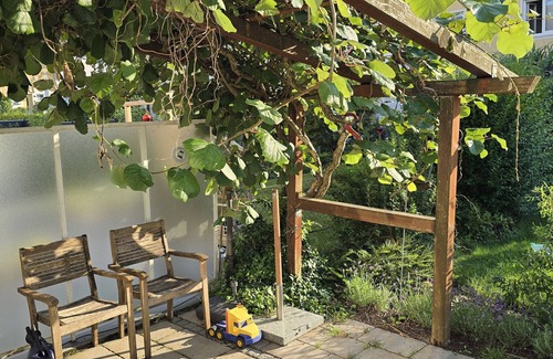 Prien am Chiemsee House | Holiday Home 'Charmantes Haus Mit Eigenem Garten' with Private Terrace, Private Garden and Wi-Fi