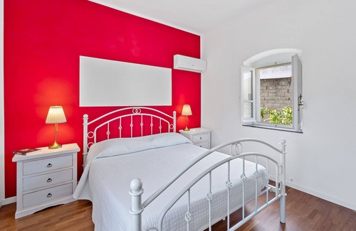 Dolianova House | Holiday Home 'Domus Dama' with Shared Garden, Wi-Fi and Air Conditioning