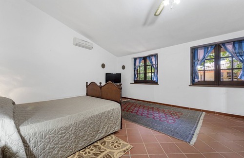 Iglesias House | Holiday Home For Families 'Maria Maddalena 3' with Mountain View, Shared Pool & Wi-Fi