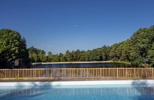 Milhac-de-Nontron Ski Chalet | Holiday Home 'Chalet Vintage' with Shared Pool, Private Terrace and Shared Garden