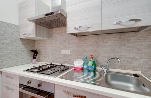 Suni House | Holiday Home 'Happy' with Partial Sea View, Private Terrace and Air Conditioning