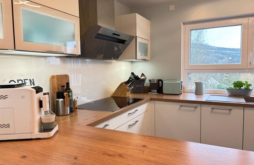 Watzerath House | Holiday Home 'Im Grünen' with Private Terrace, Wi-Fi and Air Conditioning