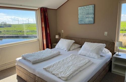Stavoren House | Holiday Home in Warns with Private Jetty