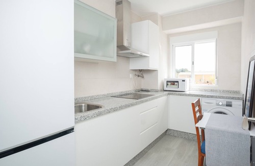 Distrito Sur House | Holiday Home 'La Oliva Bien Comunicado' with Balcony and Air Conditioning