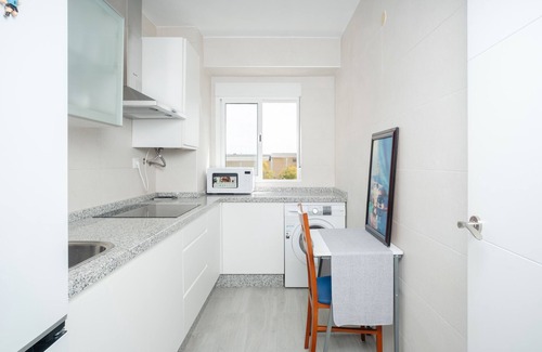 Distrito Sur House | Holiday Home 'La Oliva Bien Comunicado' with Balcony and Air Conditioning