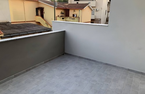 Gonnesa House | Holiday Home 'Luciano' with Private Terrace, Wi-Fi and Air Conditioning