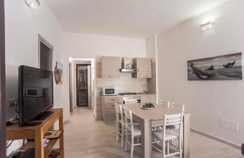 Santa Margherita di Pula House | Holiday Home “Marisol” close to the Beach with Wi-Fi, A/C, Terraces & Garden
