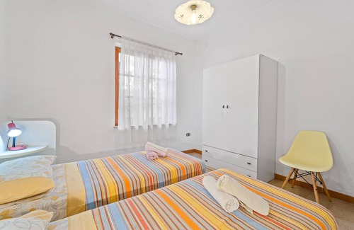 Fluminimaggiore House | Holiday Home 'Orchidea' with Private Terrace, Wi-Fi and Air Conditioning