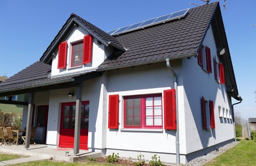 Breege House | Holiday Home 'Sabines Badehaus Mit Innenpool' with Lake View, Private Terrace and Wi-Fi