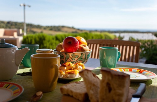 Siniscola House | Holiday Home 'S'ena E Mammai' with Sea View, Garden, Terrace and Wi-Fi