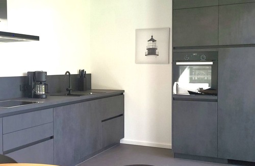 Muldestausee House | Holiday Home 'Schlossterrassen 8a' with Lake View, Private Terrace and Wi-Fi