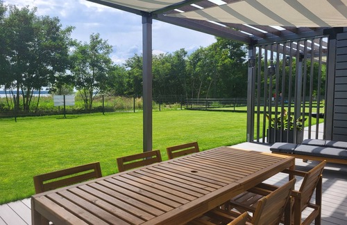 Muldestausee House | Holiday Home 'Schlossterrassen 8a' with Lake View, Private Terrace and Wi-Fi