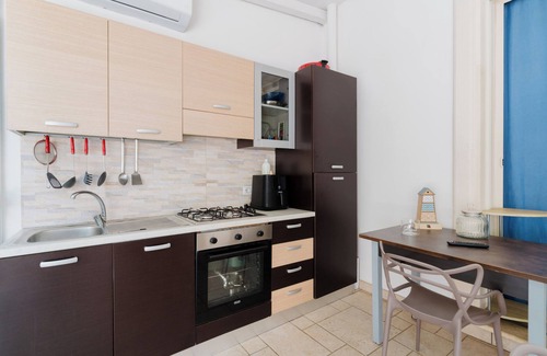 Santa Maria al Bagno House | Holiday Home 'Sofia' with Shared Pool, Balcony and Air Conditioning