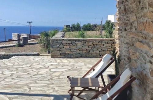 Agios Ioannis House | Holiday Home 'Stelios Cave House' with Sea View, Private Terrace and Wi-Fi