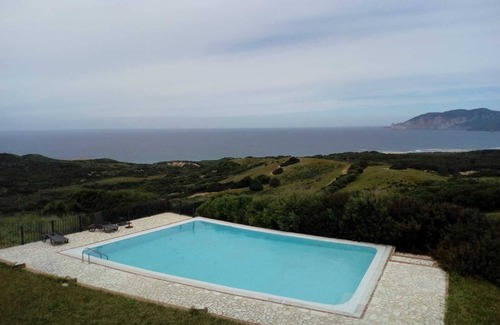 Gonnesa House | Holiday Home "Su Cuili" with Mountain View, Shared Pool & A/C